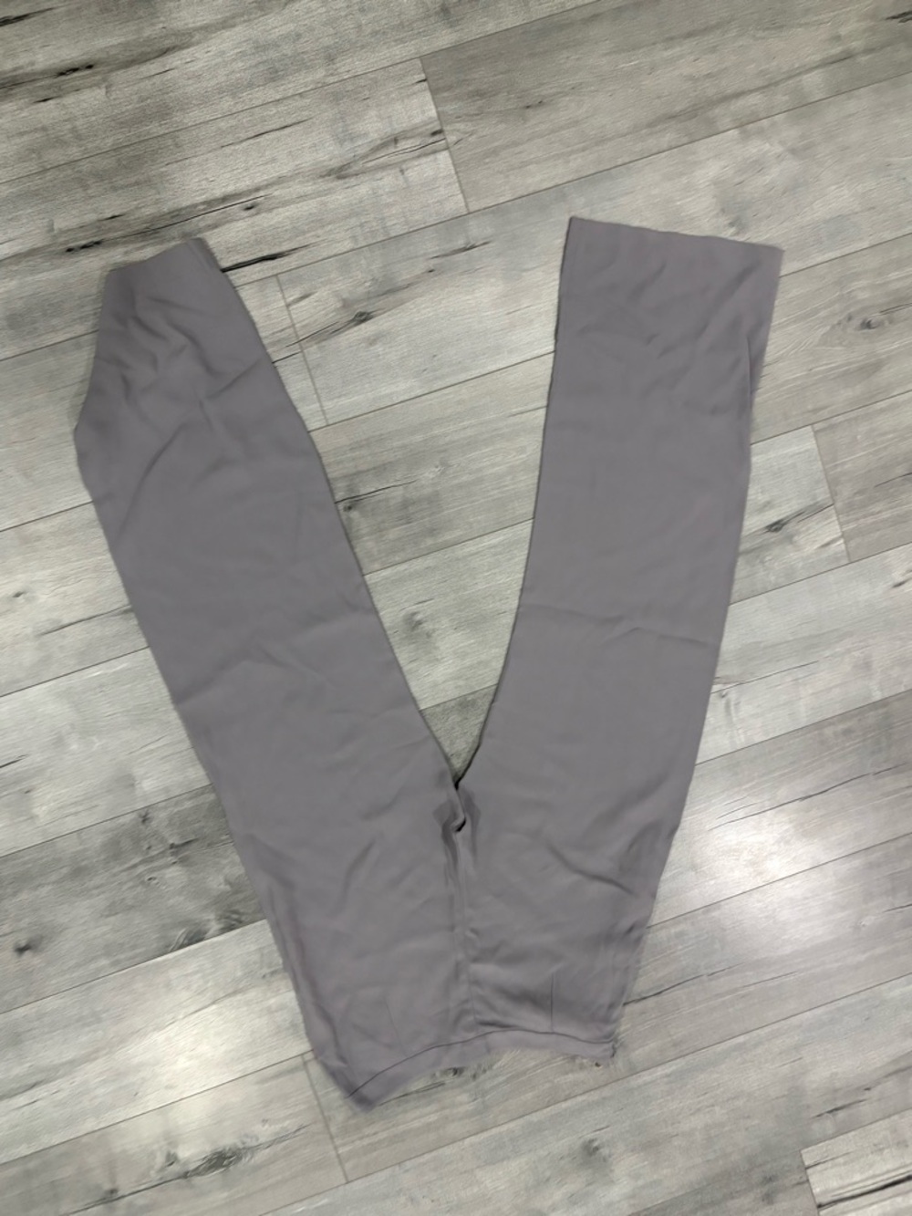 Light lavender crepe pants with gold side zippers